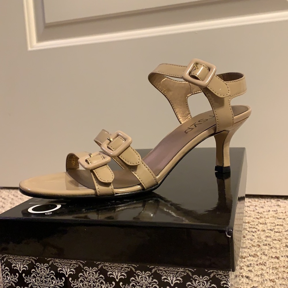 RSVP ecru patent sandals.